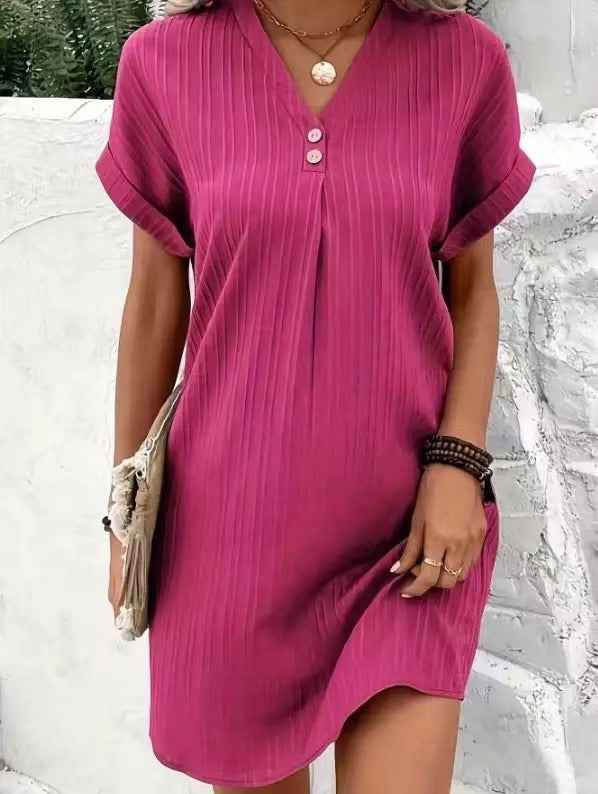 Women's V-Neck Short Sleeve Casual Dress shown front-on on model with button detail — green vertical stripe mini dress, Fifi London collection