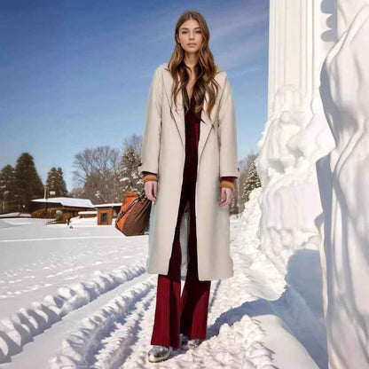 Padded Lapel Super Long Slim Jacket shown front-on on model — Fifi London Autumn collection