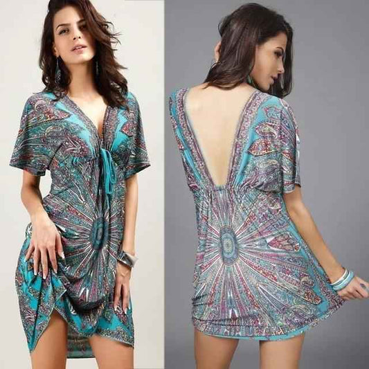 Women's Boho Tribal Print V-Neck Mini Dress shown front-on on model with batwing sleeves and adjustable waist tie — Fifi London summer collection