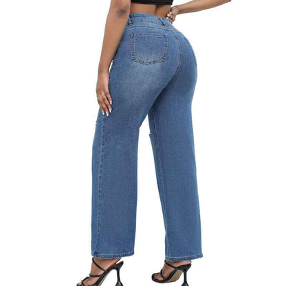 Elegant Ripped Denim Trousers shown front-on on model — Fifi London Autumn collection