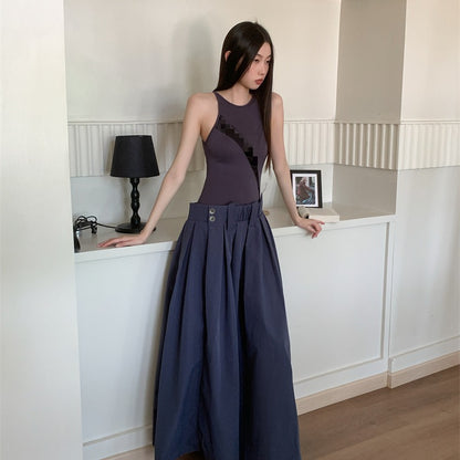 Women's long patchwork dress styled for elegant everyday wear, full-length view