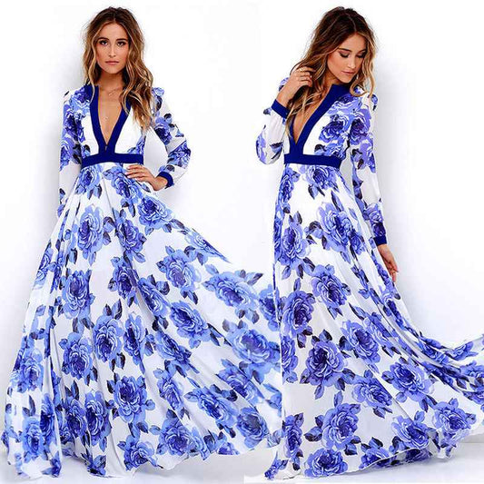 Women's blue floral print v-neck maxi dress with long sleeves shown front-on on model — Fifi London Vintage collection