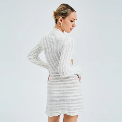 Women's white long sleeve bodycon mini dress with diagonal stripe sheer panels shown front-on on model — Fifi London Party collection