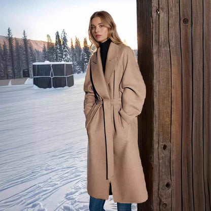 Padded Lapel Super Long Slim Jacket shown front-on on model — Fifi London Autumn collection