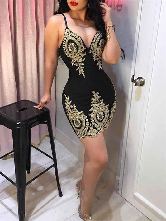Women's black gold lace embroidered spaghetti strap mini dress shown front-on on model — Fifi London Party collection