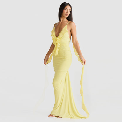 Women's solid-colour suspender dress styled for summer, full-length view