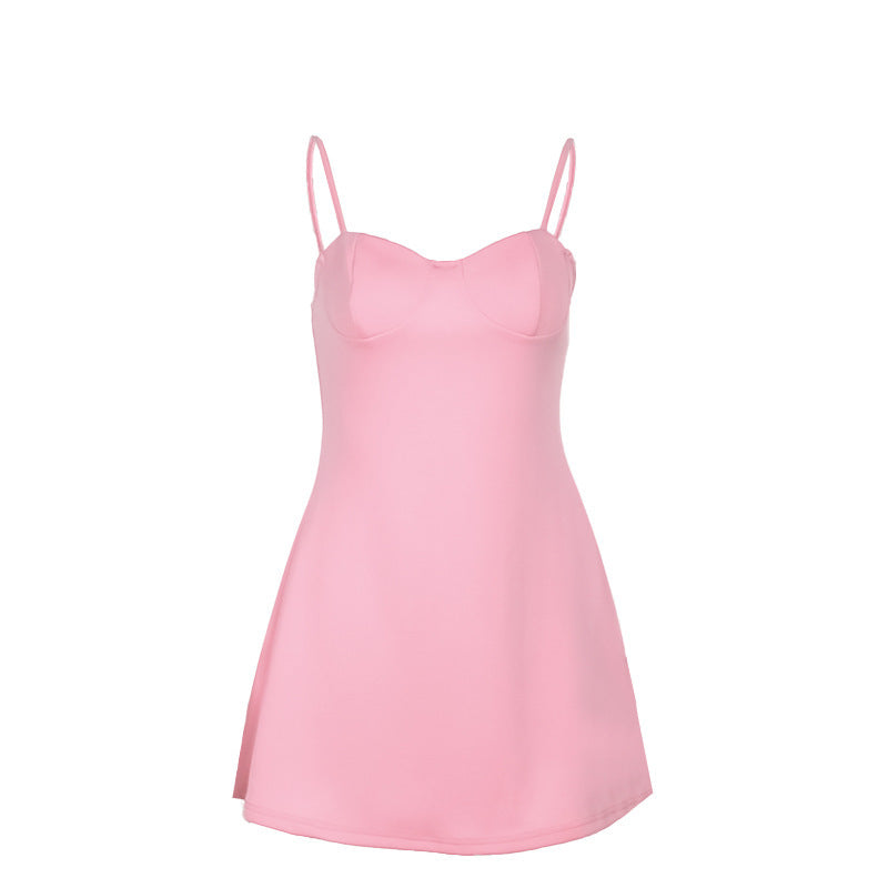 Women's pink sleeveless mini dress with slim straps shown flat lay — Fifi London Summer collection