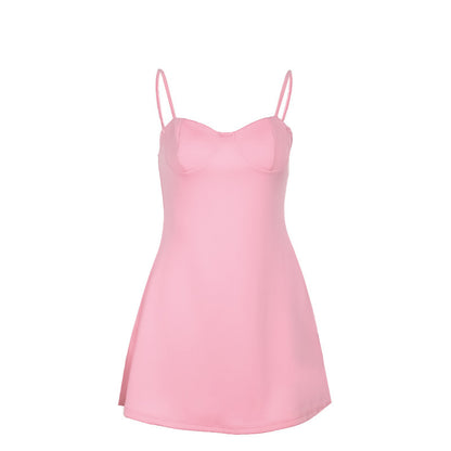 Women's pink sleeveless mini dress with slim straps shown flat lay — Fifi London Summer collection