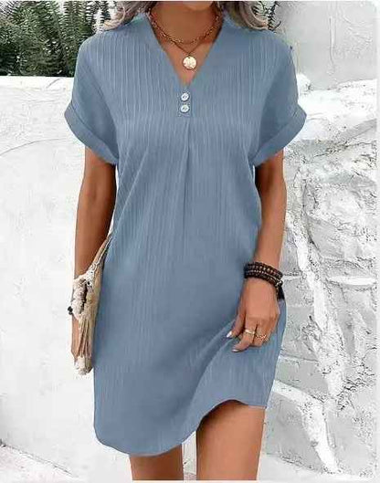 Women's V-Neck Short Sleeve Casual Dress shown front-on on model with button detail — green vertical stripe mini dress, Fifi London collection