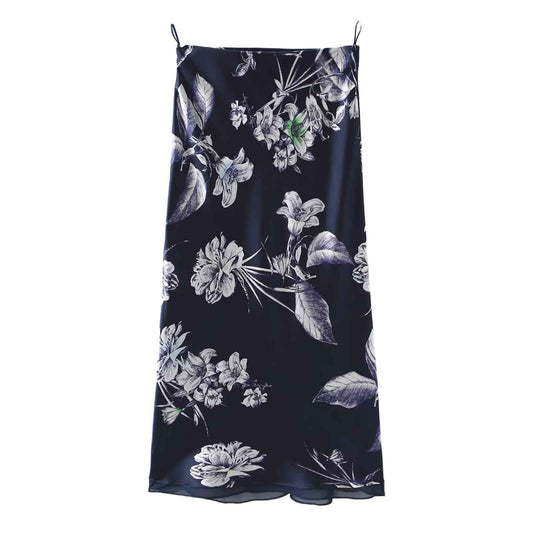 Women's Satin Midi Floral Print Skirt shown flat lay — navy/black base with white and grey botanical floral print, satin finish, thin straps — Fifi London Spring collection