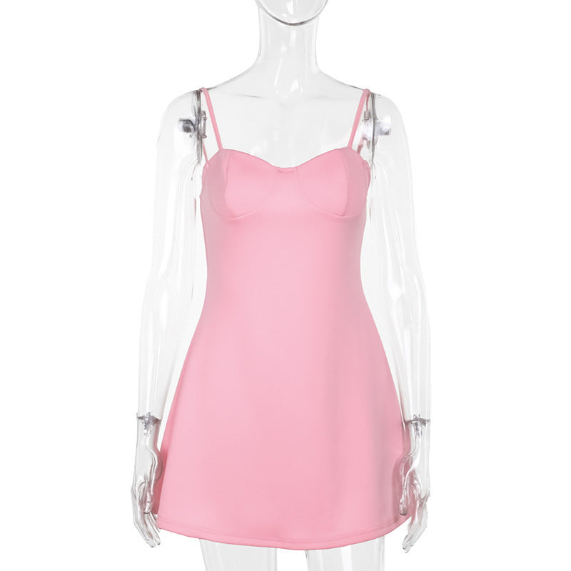 Women's pink sleeveless mini dress with slim straps shown flat lay — Fifi London Summer collection