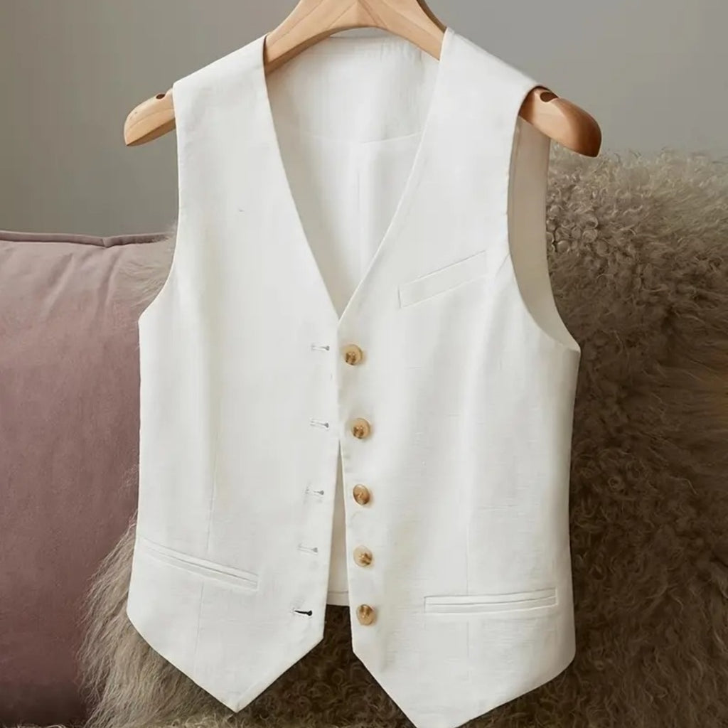 linen vest for women

waist cinched jacket

casual elegant outerwear

sleeveless linen jacket

breathable summer vest

spring layering piece

ladies lightweight jacket

chic linen outerwear

minimalist fashion vest

women’s tailored vest