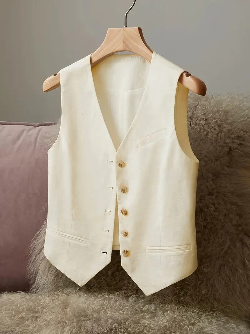 linen vest for women

waist cinched jacket

casual elegant outerwear

sleeveless linen jacket

breathable summer vest

spring layering piece

ladies lightweight jacket

chic linen outerwear

minimalist fashion vest

women’s tailored vest