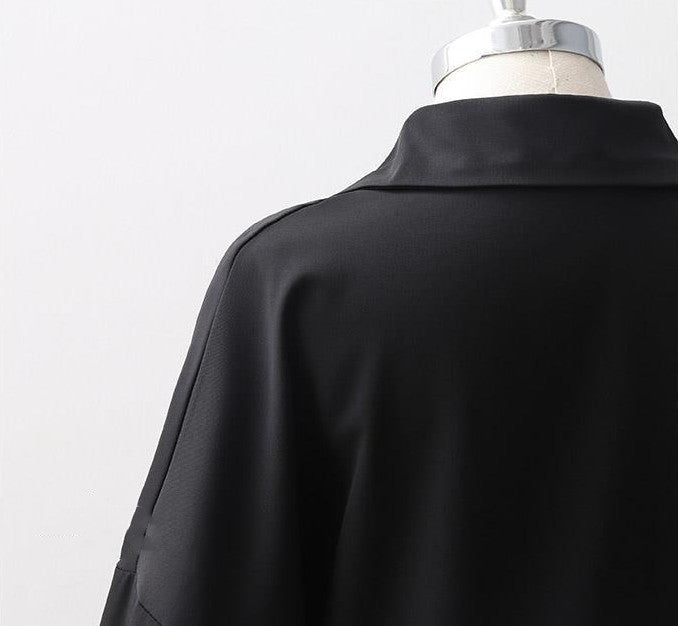 Women's Loose Long Sleeve Lapel Shirt shown front-on on mannequin — white solid colour, button front, voluminous sleeves — Fifi London Autumn collection