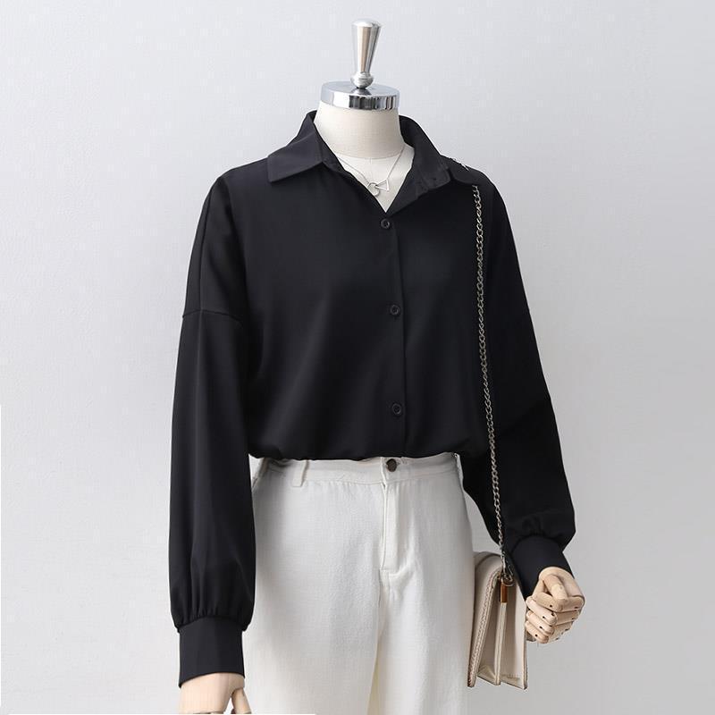 Women's Loose Long Sleeve Lapel Shirt shown front-on on mannequin — white solid colour, button front, voluminous sleeves — Fifi London Autumn collection