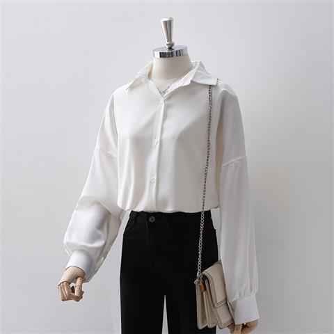 Women's Loose Long Sleeve Lapel Shirt shown front-on on mannequin — white solid colour, button front, voluminous sleeves — Fifi London Autumn collection