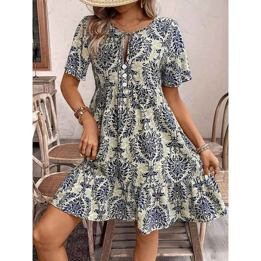 Women’s Floral Wrap Midi Dress shown front-on on model — Fifi London Summer collection