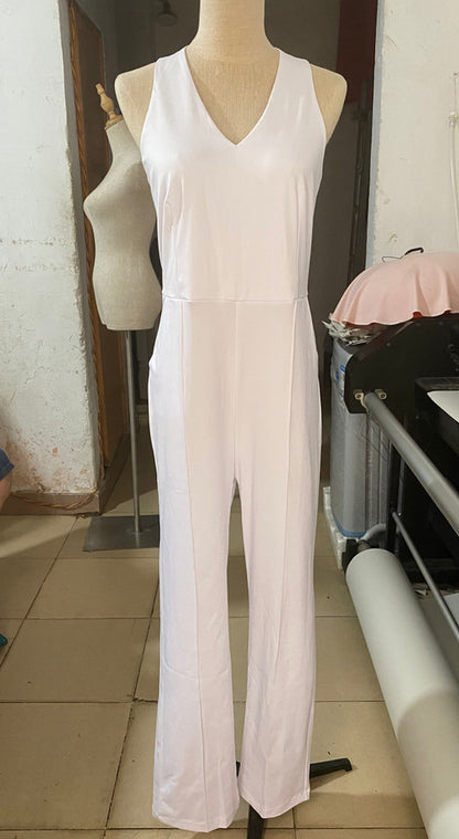 Women's White V-Neck Halter Backless Jumpsuit shown front-on on model — Fifi London Summer collection