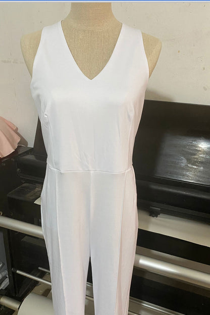 Women's White V-Neck Halter Backless Jumpsuit shown front-on on model — Fifi London Summer collection