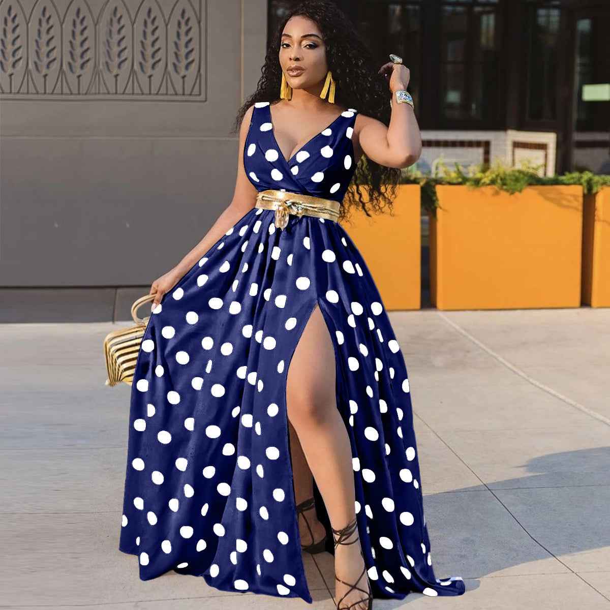 Women's Printed Maxi Party Dress shown front-on on model — deep V-neck, thigh-high slit, black polka dot print — Fifi London
