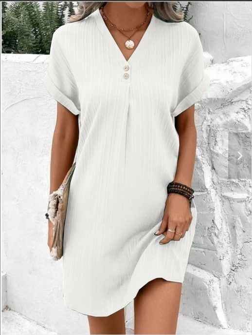 Women's V-Neck Short Sleeve Casual Dress shown front-on on model with button detail — green vertical stripe mini dress, Fifi London collection