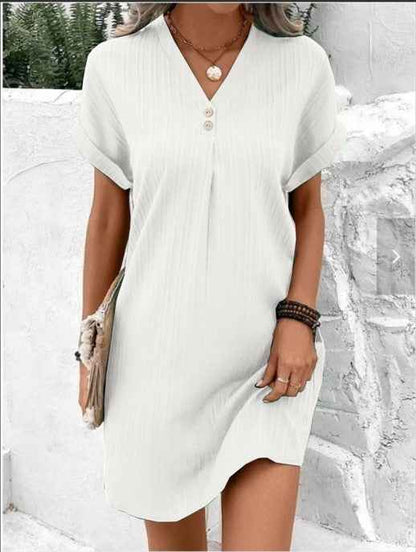 Women's V-Neck Short Sleeve Casual Dress shown front-on on model with button detail — green vertical stripe mini dress, Fifi London collection