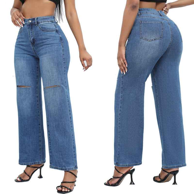 Elegant Ripped Denim Trousers shown front-on on model — Fifi London Autumn collection